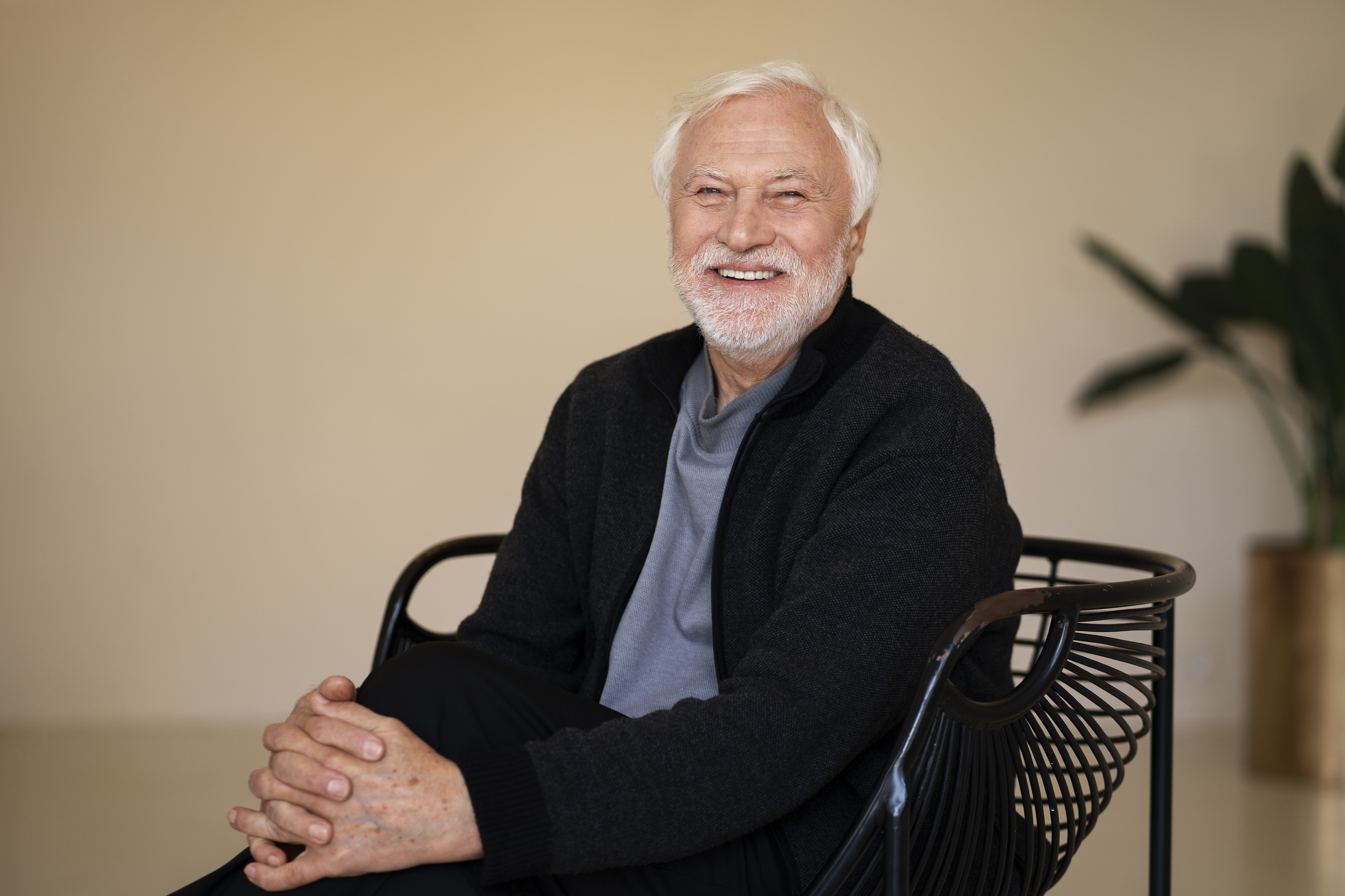 Smiling middle-aged business executive in formal attire